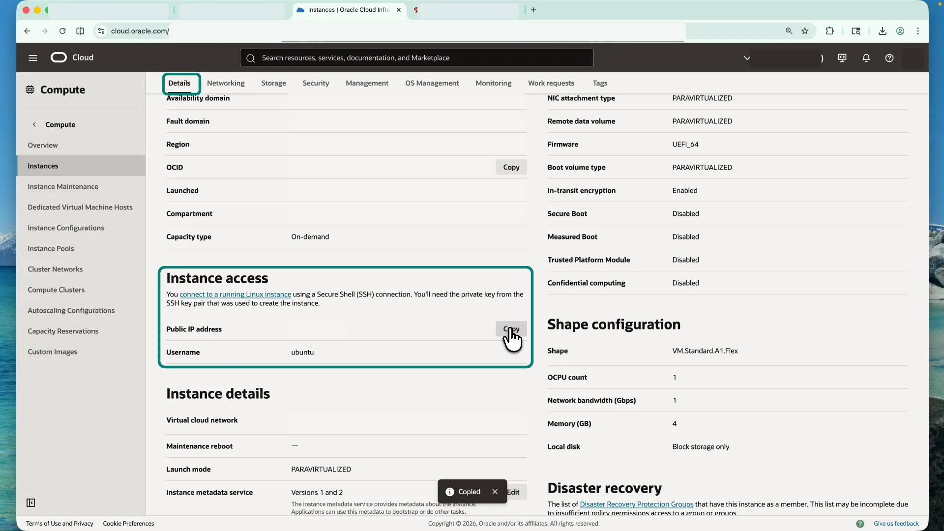 The full Oracle Cloud browser window for a running compute instance. The Details tab is selected, and the Instance access section contains the Public IP address row, its Copy button, and the Ubuntu username.
